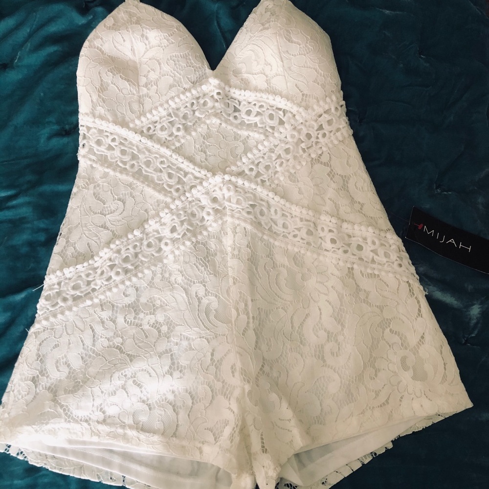White lace romper, never worn, size large